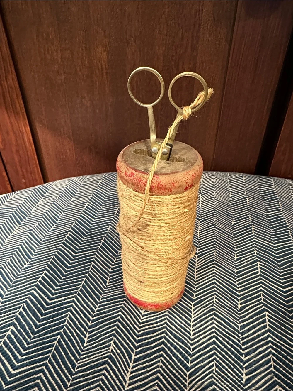 Vintage wooden spool with twine • scissors